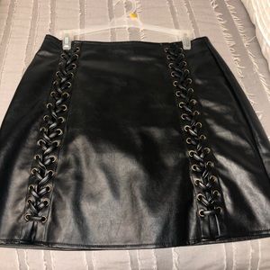 Black leather skirt with ties